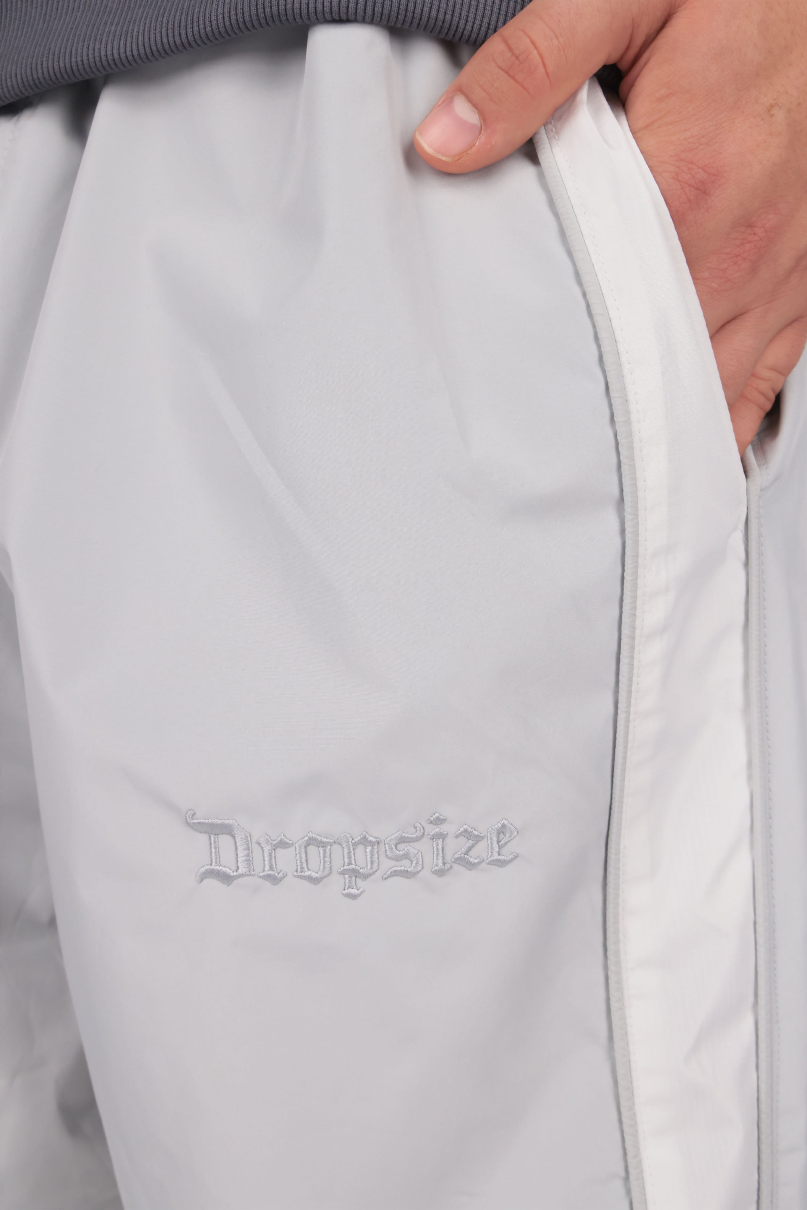 DROPSIZE CURVED TRACKPANTS GREY