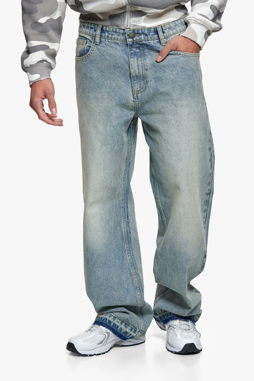 OPEN LEG JEANS WASHED BLUE