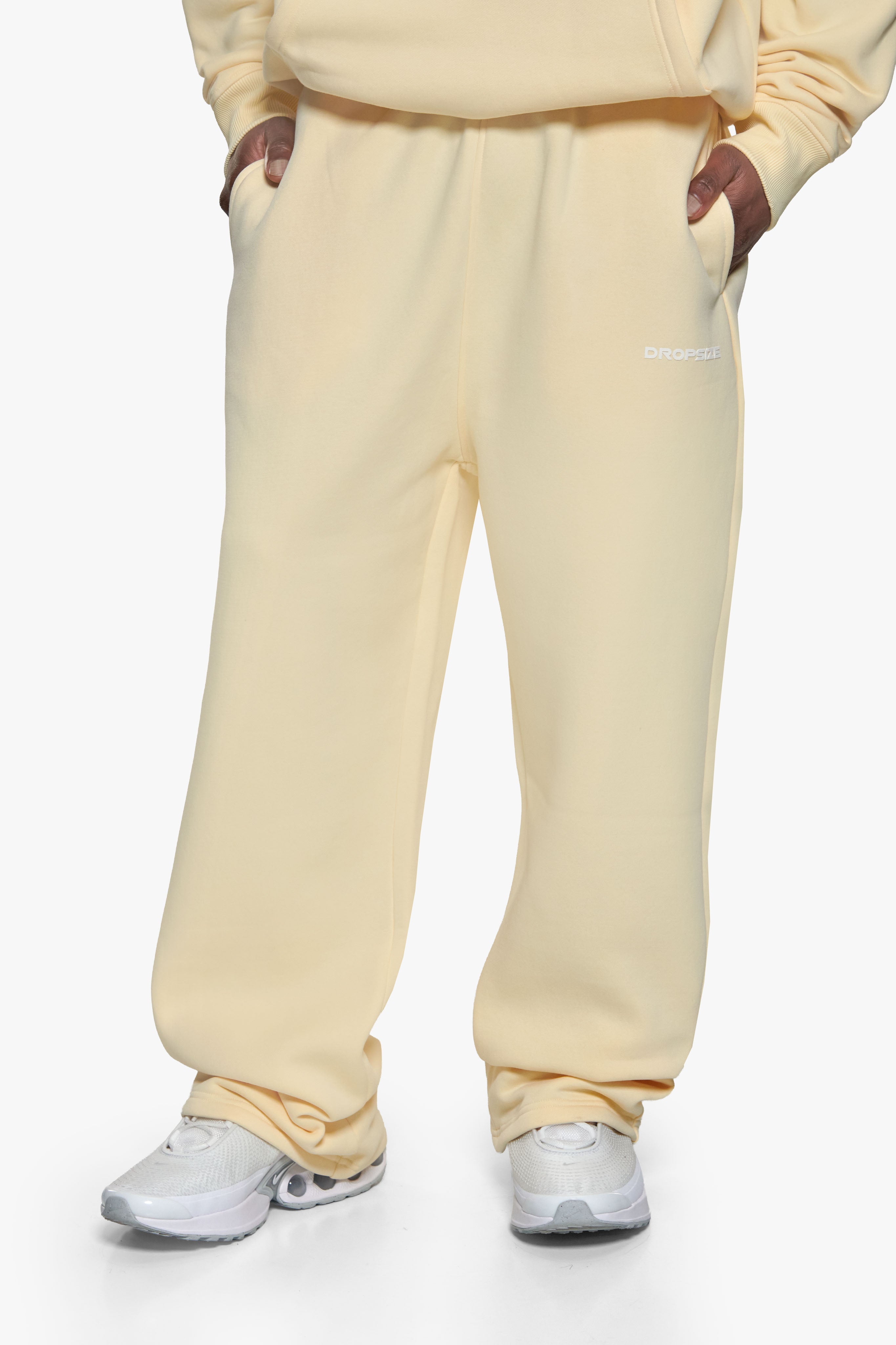 SLEEK LOGO OPEN LEG JOGGER BUTTER YELLOW