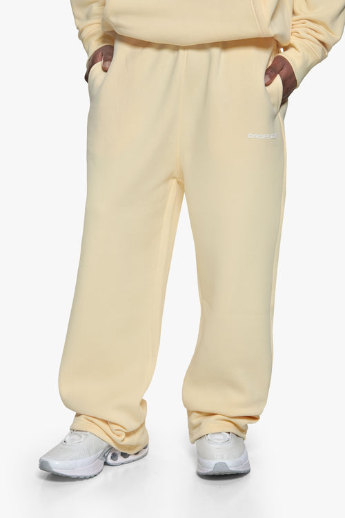 SLEEK LOGO OPEN LEG JOGGER BUTTER YELLOW