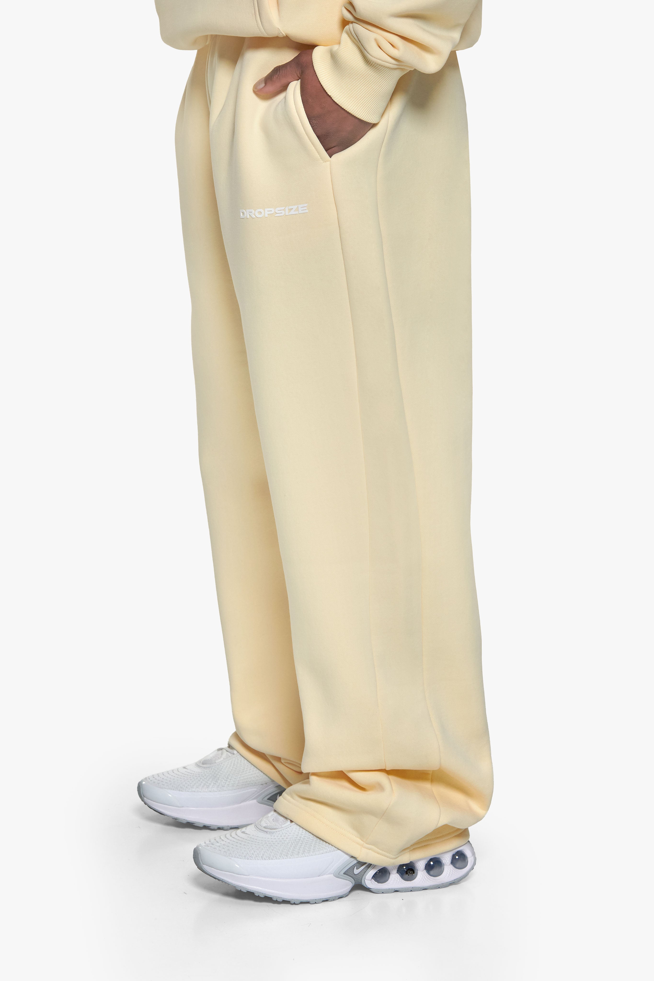 SLEEK LOGO OPEN LEG JOGGER BUTTER YELLOW