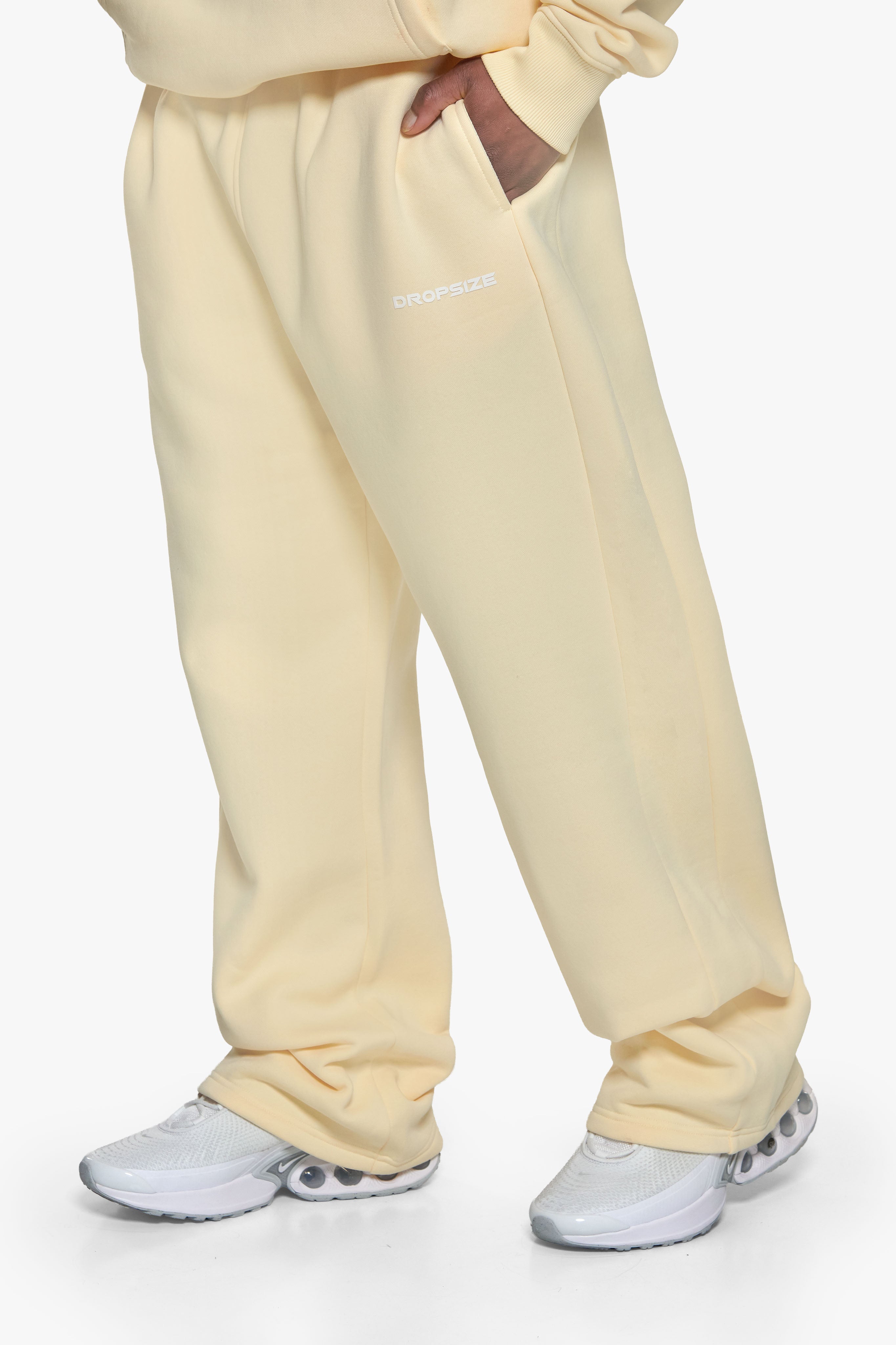 SLEEK LOGO OPEN LEG JOGGER BUTTER YELLOW